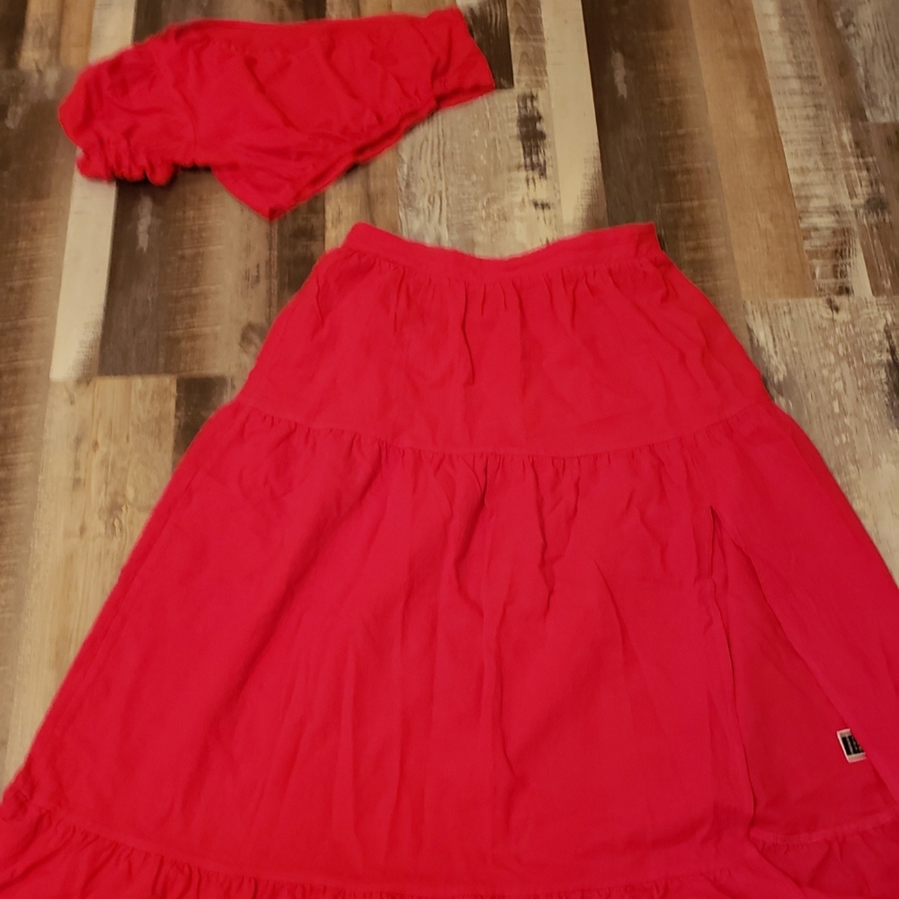 Acute crop top with a long flowy skirt to your ankle.